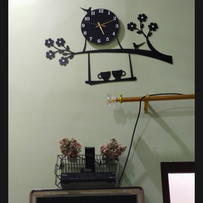 Sparrow on tree with coffee cups