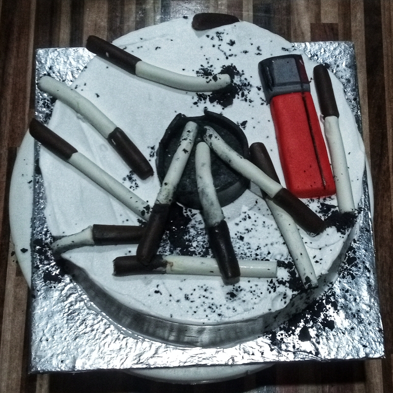 Cigarette theme cake