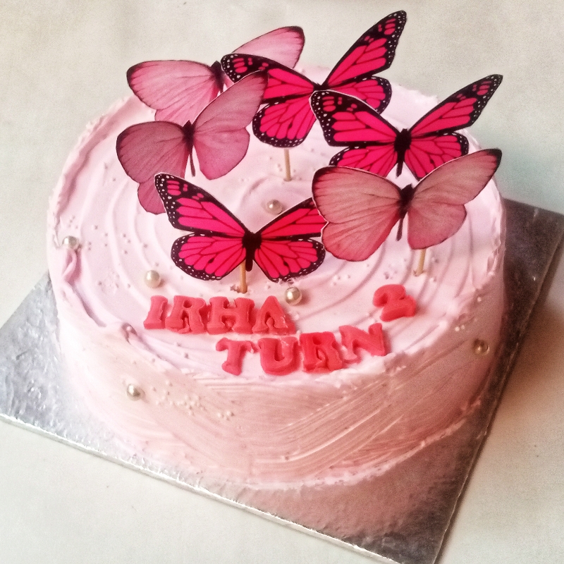 Pink butterflies theme cake
