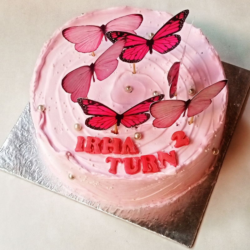 Pink butterflies theme cake